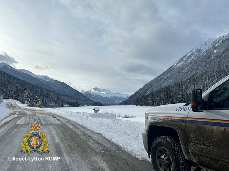 View of a Lillooet RCMP vehicle and Duffey Lake after the first snowfall of 2024. 